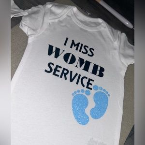 Womb service onesie